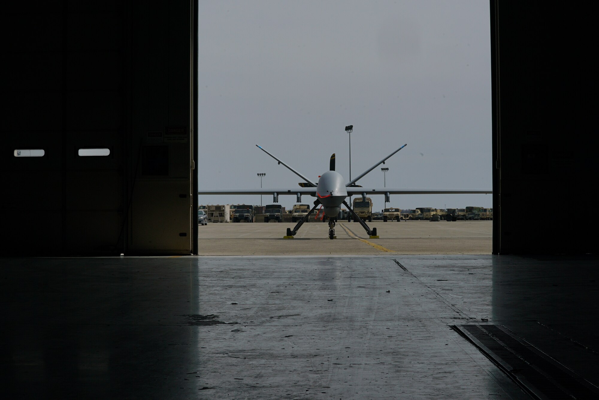 An MQ-9 Reaper from the New York National Guard sits outside the 178th Wing hanger, during the 2025 Advanced Wrath Distinguished Visitor and Industry Leader Day, at Springfield Air National Guard base, 19 March, 2025. The 178th Wing Operations Group invited the attendees to observe and learn about the MQ-9 from operators. (U.S. Air National Guard photo by Staff Sgt. Jillian Maynus, 178th Wing)