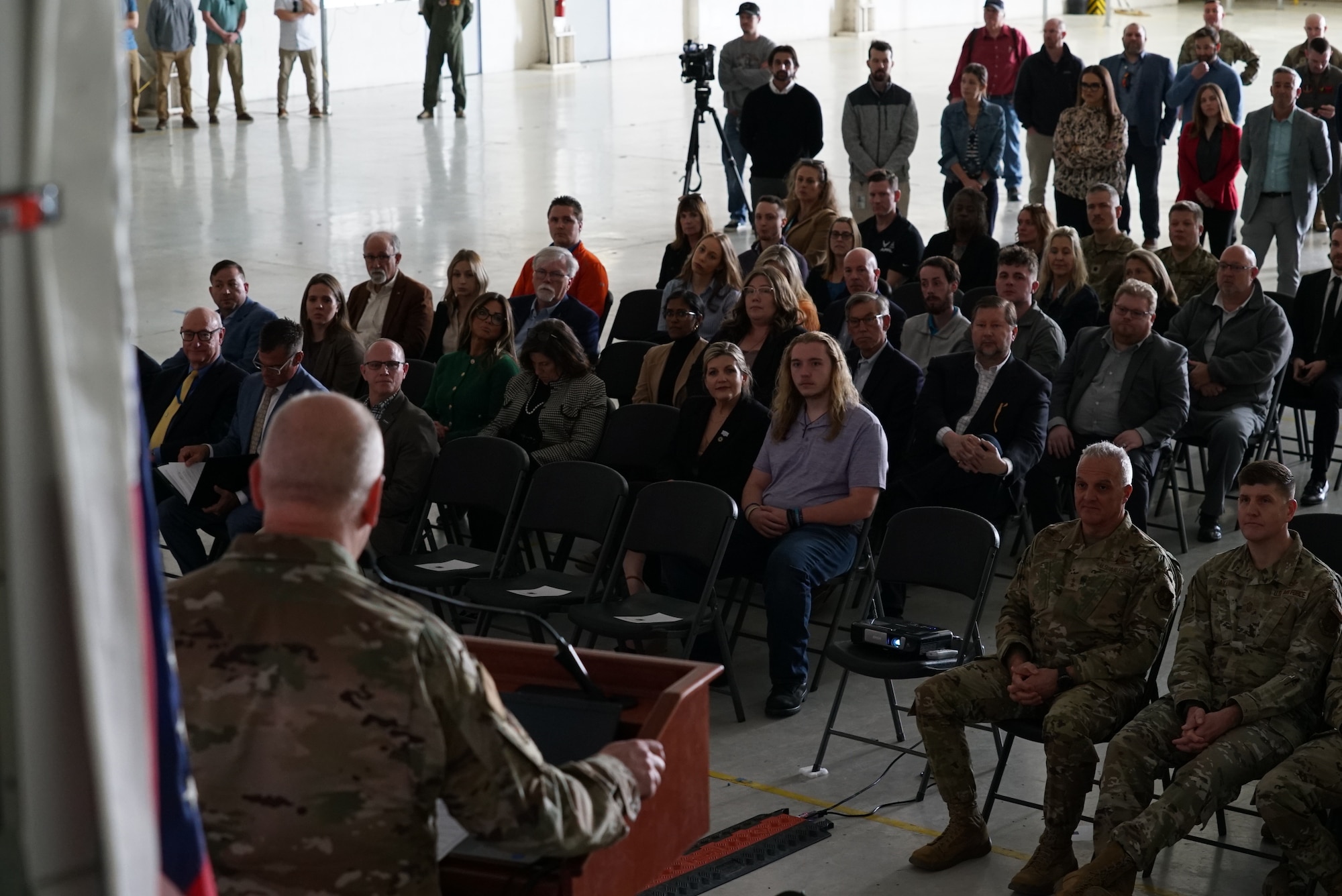 Col. Don Braskett, 178th Wing Commander, speaks on the collaborative training exercise Advanced Wrath, during the 2025 Advanced Wrath Distinguished Visitor and Industry Leader Day, at Springfield Air National Guard base, 19 March, 2025. The 178th Wing Operations Group invited the attendees to observe and learn about the MQ-9 from operators. (U.S. Air National Guard photo by Staff Sgt. Jillian Maynus, 178th Wing)