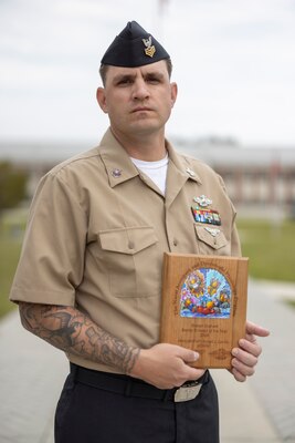 U.S. Navy Hospital Corpsman First Class Robert Zaruba, from Florida, an aeromedical safety corpsman with 2nd Marine Aircraft Wing, poses for a portrait at Marine Corps Air Station Cherry Point, North Carolina, March. 28, 2025. Zaruba was named the Robert Graham Senior Enlisted Aerospace Physiology Professional of the Year for outstanding performance as an aeromedical safety corpsman.  (U.S. Marine Corps photo by Cpl. David Ornelas Baeza)
