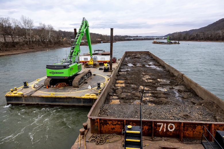 The dredging contract consists of two dredging crews that have been working six days a week since September. The crews have removed more than 314 barges of material so far, equivalent to 166,000 tons of soil, rocks and debris from the river bottom.