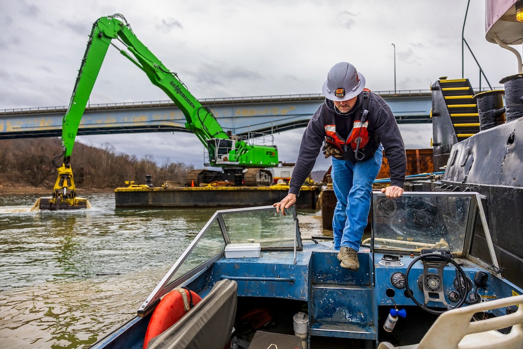 The dredging contract consists of two dredging crews that have been working six days a week since September. The crews have removed more than 314 barges of material so far, equivalent to 166,000 tons of soil, rocks and debris from the river bottom.