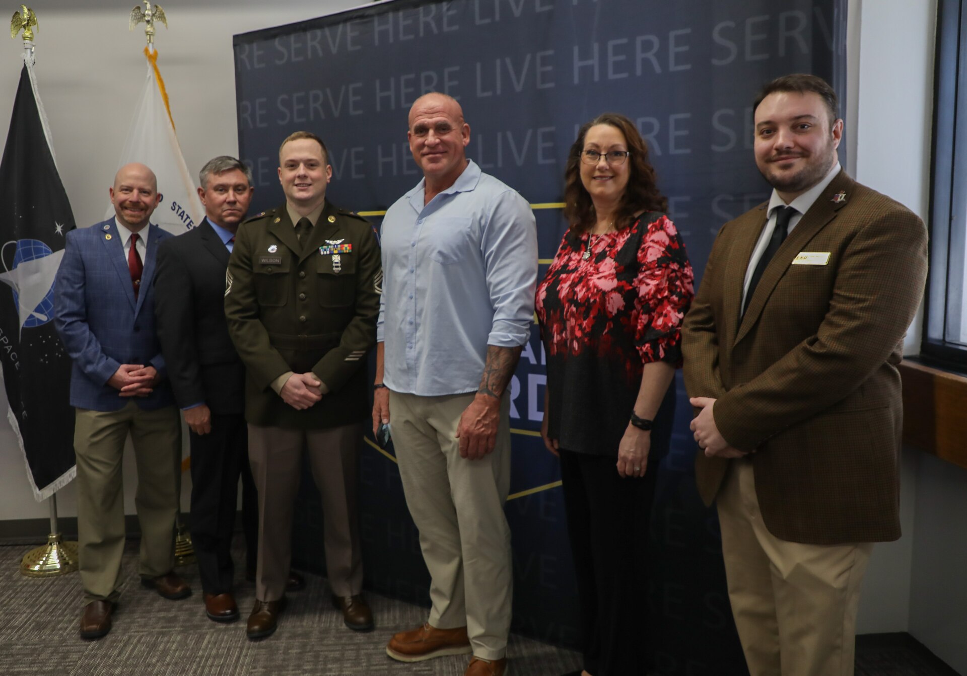 Members of the Kentucky National Guard Education and Incentives Team and the EKU Office of Military and Veteran Affairs gather after leaders from the university and the Guard sign a memorandum of understanding, Mar. 26, 2025.