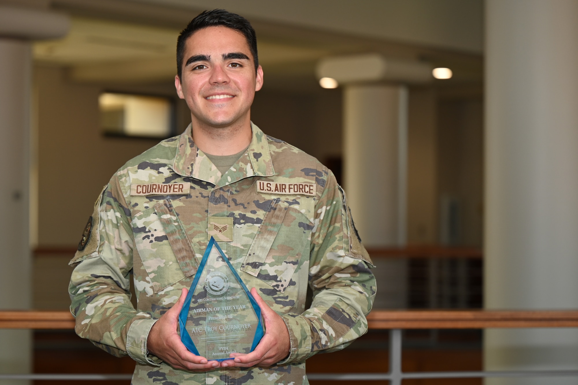 U.S. Air Force Senior Airman Troy Cournoyer, 42nd Contracting Squadron contracting specialist, poses for a photograph at Maxwell Air Force Base, Alabama, March 24, 2025.