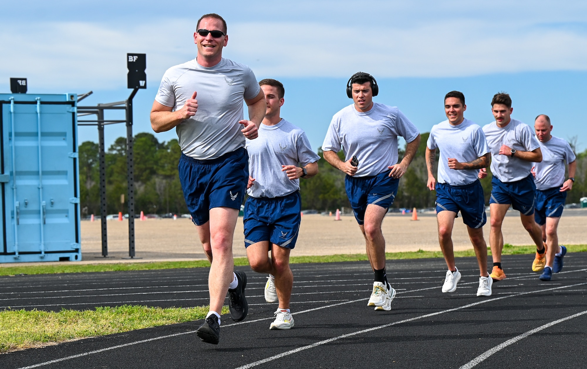 U.S. Airmen from the 42nd Contracting Squadron run during unit physical training at Maxwell Air Force Base, Alabama, March 26, 2025.