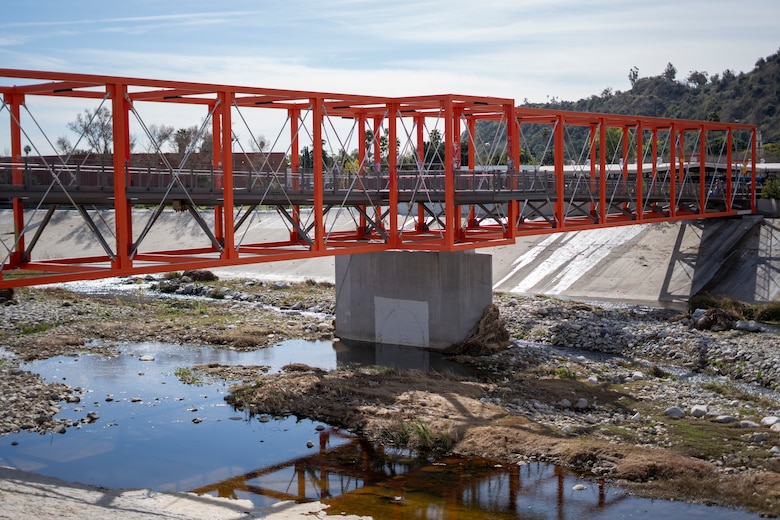 A pedestrian bridge stretching across Reach 6 of the Los Angeles River is pictured Feb. 27 next to LA’s historic Taylor Yard.