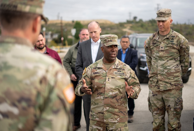 Maj. Gen. Jason Kelly, U.S. Army Corps of Engineers deputy commanding general for Civil Works and Emergency Operations, center, talks with fellow USACE leaders and subject-matter experts during a March 4 tour of Whittier Narrows Dam in Montebello, California. Kelly was accompanied by fellow USACE leaders and subject-matter experts from both the Los Angeles and Tulsa districts, as well as the South Pacific and Southwestern divisions, to firm up his understanding of the Whittier Narrows Dam Safety Modification Project.
