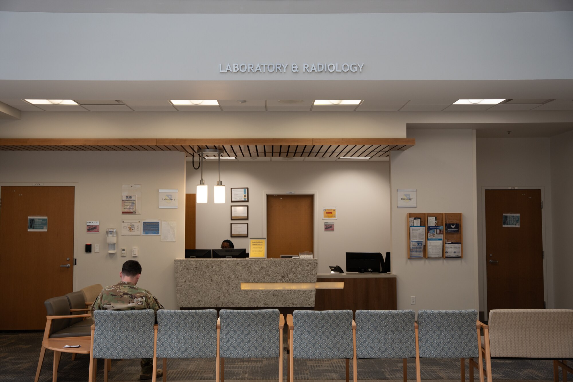 An Air Commandos sits in the lobby for laboratory and radiology services.