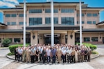 Adm. Samuel Paparo, commander of U.S. Indo-Pacific Command, joins Surangel Whipps Jr., President of the Republic of Palau, for a photo with the President’s delegation during the biannual Joint Committee Meeting at the U.S. Indo-Pacific Command Headquarters, Camp H.M. Smith, Hawaii, March 27, 2025.  USINDOPACOM is committed to enhancing stability in the Indo-Pacific region by promoting security cooperation, encouraging peaceful development, responding to contingencies, deterring aggression and, when necessary, prevailing in conflict. (U.S. Army photo by Sgt. Austin Riel)