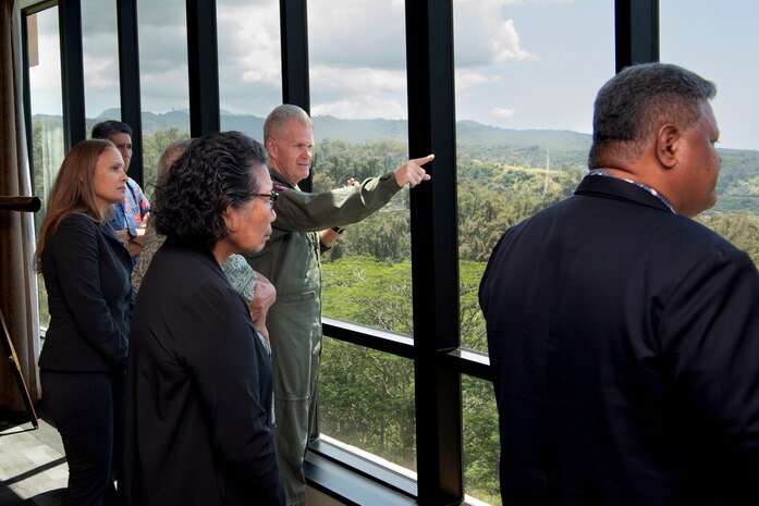 Adm. Samuel Paparo, commander of U.S. Indo-Pacific Command, shows Surangel Whipps Jr., President of the Republic of Palau, and his delegation the supporting component command and memorial locations throughout Oahu during a working lunch for the biannual Joint Committee Meeting at U.S. Indo-Pacific Command Headquarters, Camp H.M. Smith, Hawaii, March 27, 2025.
