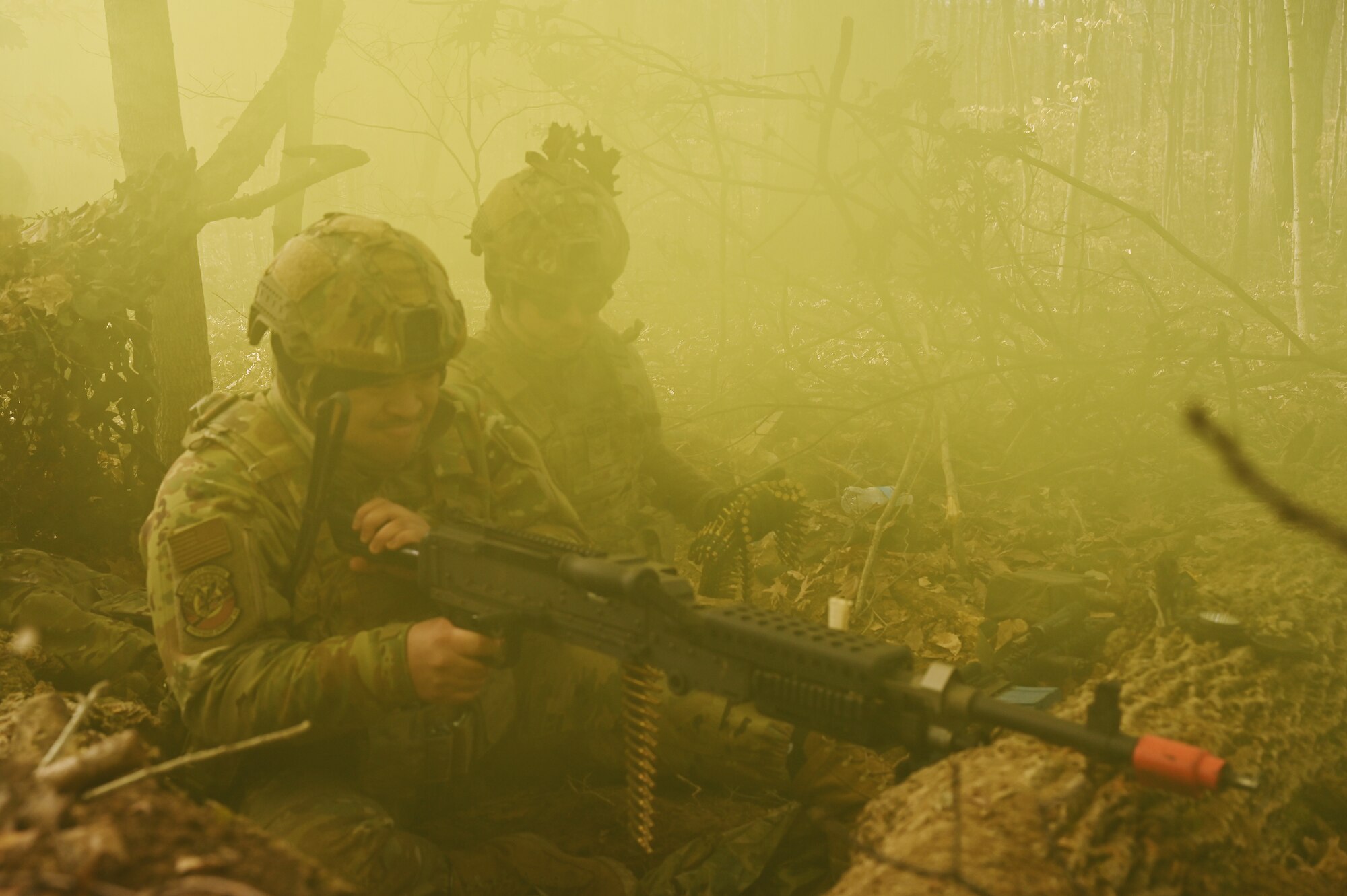 U.S. Airmen assigned to the 178th Security Forces Squadron, Ohio National Guard defend their fighting position against a simulated enemy attack Feb. 4, 2025 during annual training at Camp Holland in Butlerville, Indiana. The training, primarily focused on mission planning, included attacking and defending positions and aligning tactics with the Air Force doctrine of Agile Combat Employment. (U.S. Air National Guard photo by Shane Hughes)