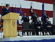 Maj. Gen. Jason Armagost speaks to Col. Patrick Hook, 595th Command and Control Group commander, and Col. David Leaumont, incoming 95th Wing commander, during the 95th Wing activation ceremony.