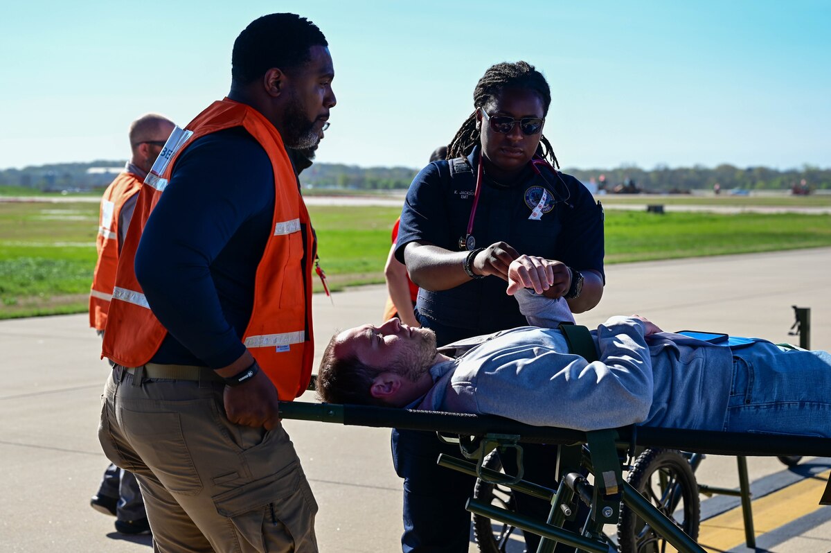 People transport a patient.