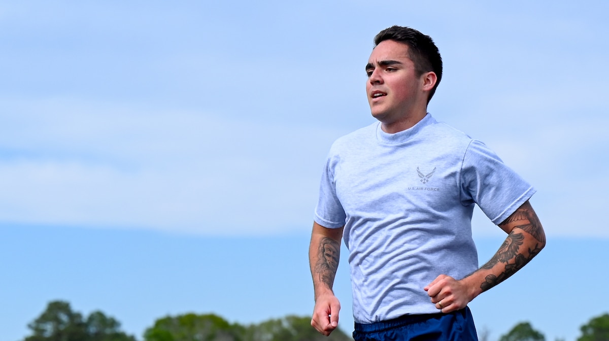 U.S. Air Force Senior Airman Troy Cournoyer, 42nd Contracting Squadron contracting specialist, runs during unit physical training at Maxwell Air Force Base, Alabama, March 26, 2025.