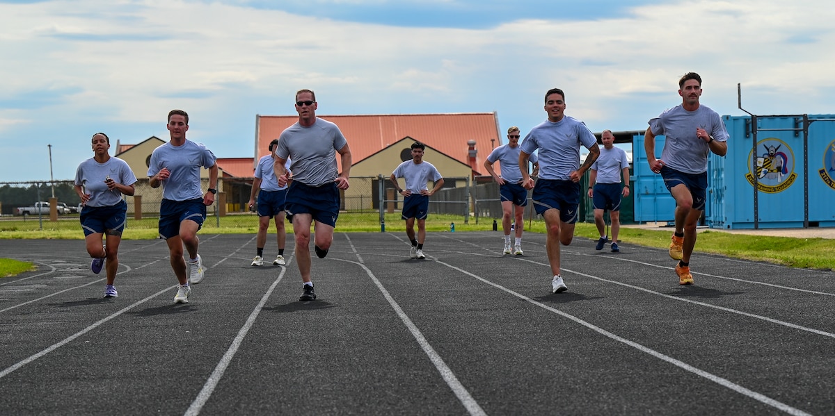 U.S. Airmen from the 42nd Contracting Squadron run during unit physical training at Maxwell Air Force Base, Alabama, March 26, 2025.