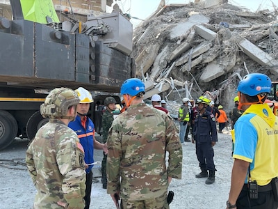 U.S. Military personnel from U.S. Indo-Pacific Command meet with first responders at the Search and Rescue Operations Center near the collapsed State Audit Office building in Bangkok, which fell after a 7.7 earthquake hit Thailand and its neighbor countries on March 28, 2025.