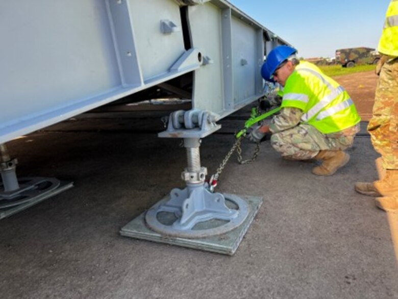 Army engineers assemble a Rapidly Available Interface for Trans-loading (RAIL) system at Coleman Barracks in Mannheim, Germany in May of 2022