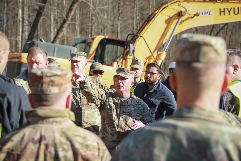 U.S. Army Brig. Gen. John Lloyd, commander of the U.S. Army Corps of Engineers North Atlantic Division, speaks to U.S. Army soldiers, Lithuanian Armed Forces, and emergency services personnel during a recovery operation near Pabradė, Lithuania, March 29, 2025.