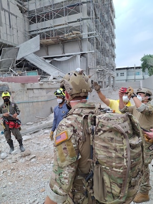U.S. Indo-Pacific Command military personnel continue to work alongside Thai military and first responders near the collapsed State Audit Office building in Bangkok, which fell after a 7.7 magnitude earthquake affected Thailand and its neighbor countries on March 28, 2025.