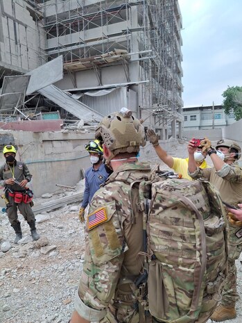 U.S. Indo-Pacific Command military personnel continue to work alongside Thai military and first responders near the collapsed State Audit Office building in Bangkok, which fell after a 7.7 magnitude earthquake affected Thailand and its neighbor countries on March 28, 2025.