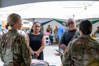 U.S. Air Force medical professionals from the 433rd Aerospace Medicine Squadron engage with residents during the Lesser Antilles Medical Assistance Team (LAMAT) 2025 health fair at Kingstown, Saint Vincent and the Grenadines, March 20, 2025.