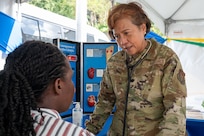 U.S. Air Force Lt. Col Zoraida Soriano, 349th Medical Squadron internal medicine doctor, conducts a health consultation with a local resident during the Lesser Antilles Medical Assistance Team (LAMAT) 2025 health fair at Kingstown, Saint Vincent and the Grenadines, March 20, 2025.