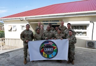 Members of the Lesser Antilles Medical Assistance Team (LAMAT) 2025 mission pose for a group photo at Celina Clouden Smart Hospital, Union Island, Saint Vincent and the Grenadines, March 20, 2025.