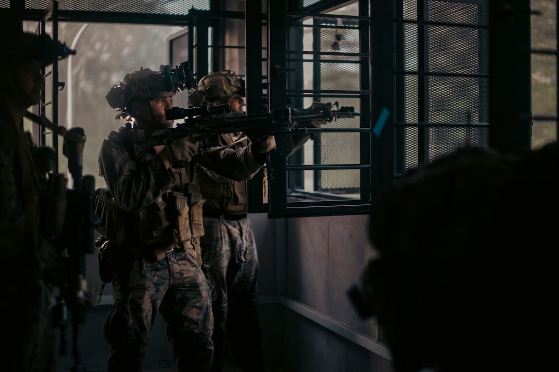 U.S. Marines with 1st Battalion, 5th Marine Regiment, 1st Marine Division, attached to Marine Rotational Force-Southeast Asia conduct the field training exercise for Valiant Mark 25 at SAFTI City training facility, Singapore, March 26, 2025. SAFTI City, the premier urban training facility in Southeast Asia, is one of the largest and most technologically advanced facilities of its kind in the world. U.S. Marines with MRF-SEA were the first foreign partner force to train at the facility during Valiant Mark 25. Valiant Mark is an annual, bilateral training exercise designed to enhance interoperability, build mutual defense capabilities, and strengthen military-to-military relationships between the U.S. Marine Corps and Singapore Armed Forces. MRF-SEA is a rotational unit derived from elements of I MEF executing a U.S. Marine Corps Forces, Pacific operational model that involves training events and exchanges with partner military subject matter experts, promotes security goals with allied and partner nations, and ensures a persistent I MEF stand-in presence west of the international date line. (U.S. Marine Corps photo by Sgt. Shaina Jupiter)