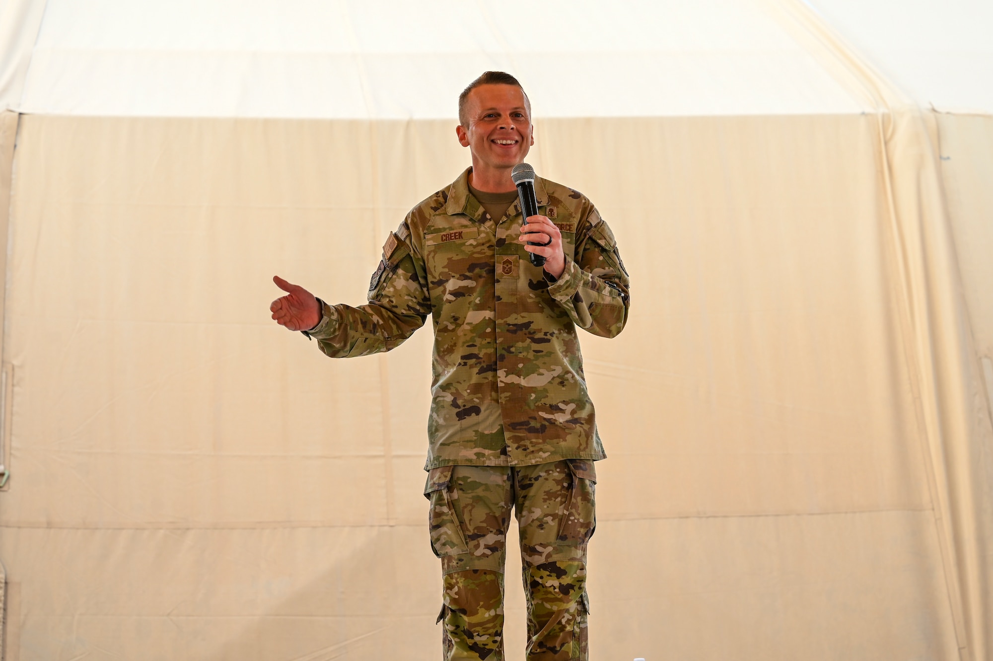 U.S. Air Force Chief Master Sgt. Steven Creek, 378th Air Expeditionary Wing command chief, gives a speech in the U.S. Central Command area of responsibility, March 7, 2024.