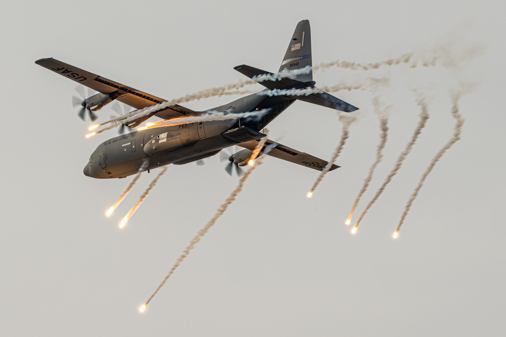 A C-130J Super Hercules from the Kentucky Air National Guard’s 123rd Airlift Wing deploys flares as part of an aerial demonstration during the Thunder Over Louisville air show and fireworks display in Louisville, Ky., April 20, 2024.