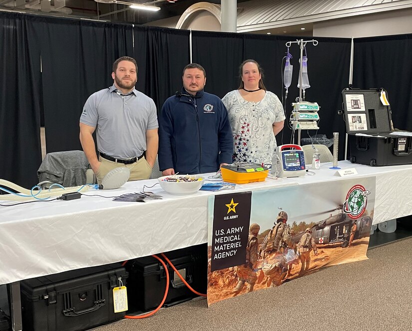 From left, Mike Tagliaferri, George Takacs and Ann Thomas are pictured at the U.S. Army Medical Materiel Agency’s booth during the “Explore to Know More” event at Tobyhanna Army Depot, Pennsylvania. The team at USAMMA’s Medical Maintenance Operations Division at Tobyhanna showcased the medical maintenance career field during the two-day event.