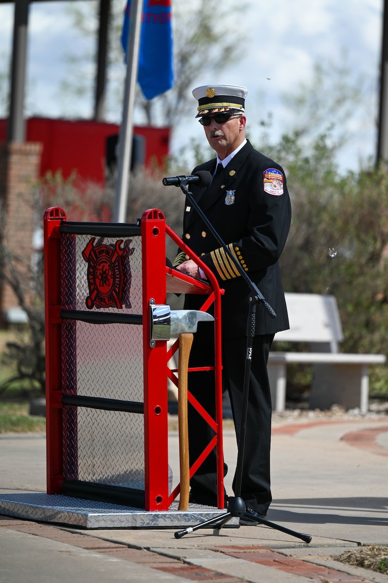 Jeffrey Felty, Holloman Installation Fire Chief,  speaks during the annual Department of Defense Fallen Firefighter Memorial Service at the Fire Protection Heritage Pathway, Goodfellow Air Force Base, Texas, March 28, 2025. The ceremony included the firefighters' prayer, a lowering of the flag to half-staff, and the firefighters’ final call. (U.S. Air Force photo by Staff Sgt. Nathan Call)