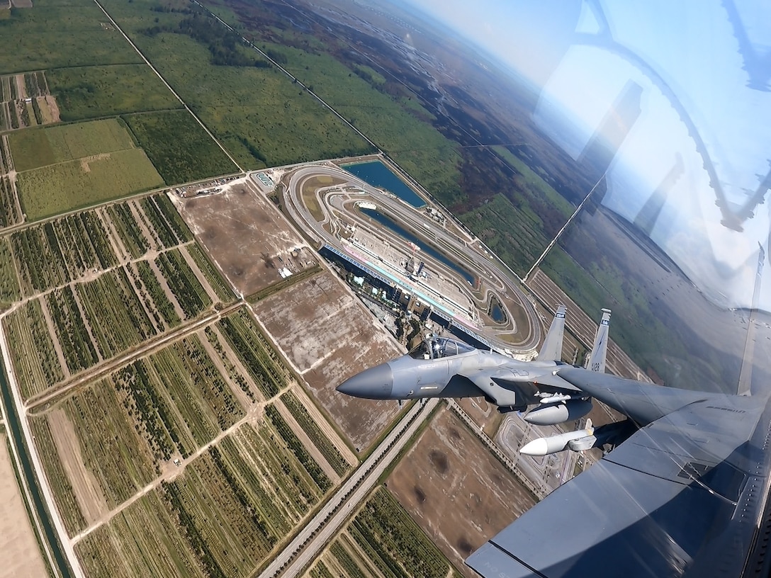 An F-15 fighter jet from the Florida Air National Guard’s 125th Fighter Wing, Detachment 1, intercepted a simulated Temporary Flight Restriction violator during a demonstration near Homestead Air Reserve Base, Florida, March 26, 2025. The exercise, coordinated with a Civil Air Patrol Cessna, highlighted the importance of TFR compliance and the teamwork and precision of NORAD pilots tasked with protecting North American airspace.