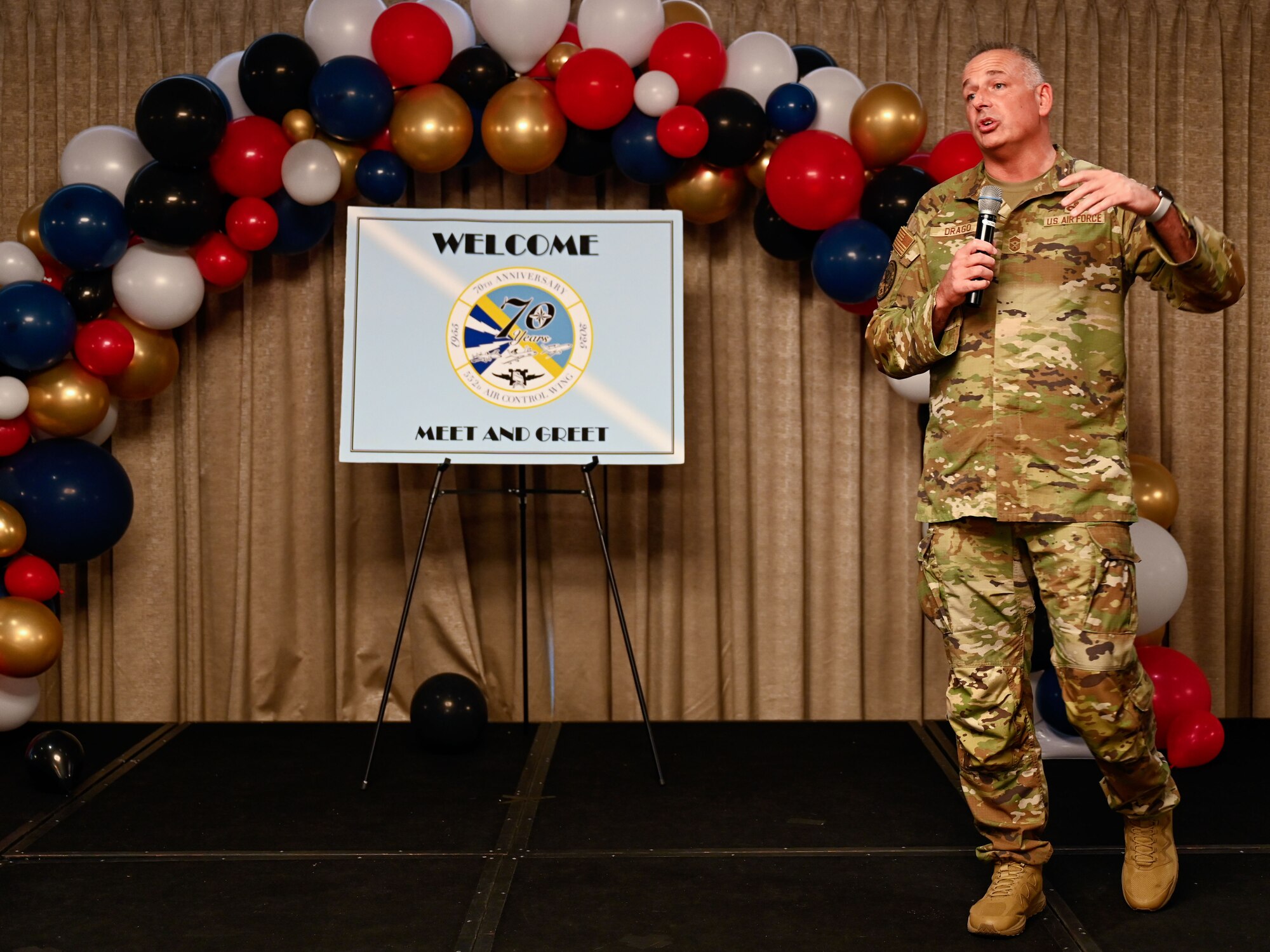 Chief Master Sgt. Nikko Drago, 552nd Air Control Wing command chief, speaks during the wing’s 70th anniversary celebration at Tinker Air Force Base, Oklahoma, March 26, 2025.
The celebration honored generations of Airmen who have contributed to the wing’s enduring mission.
(U.S. Air Force photo by Garrett N. Cole)
