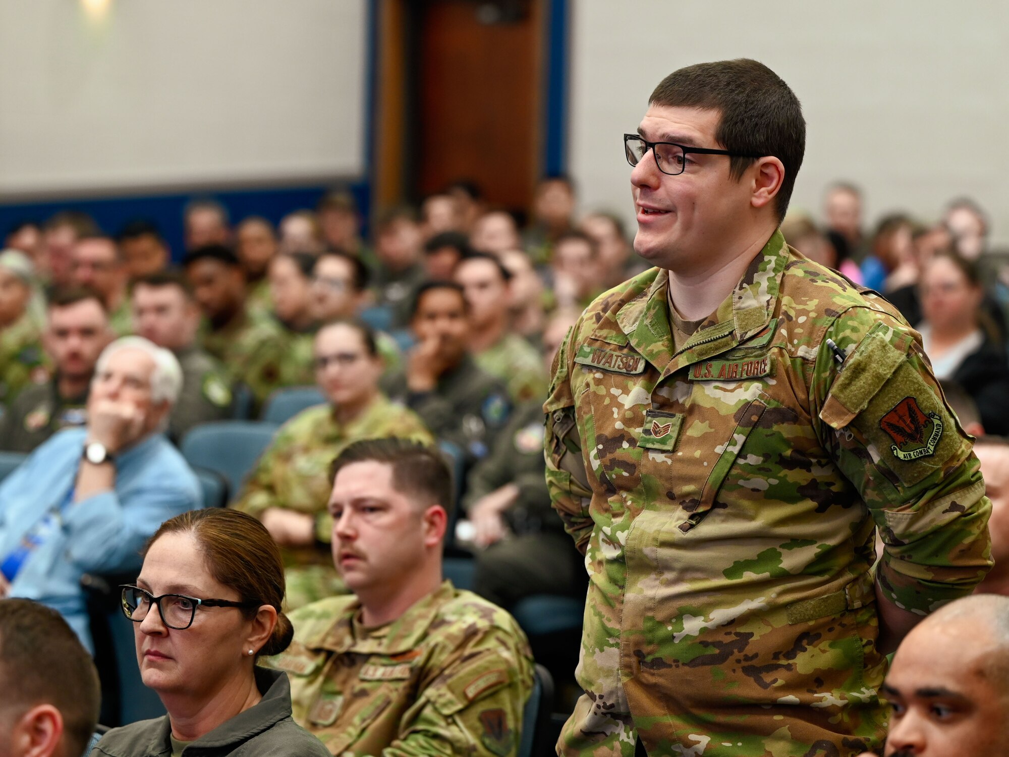 An Airman asks a question during a fireside chat hosted by the 552nd Air Control Wing at Tinker Air Force Base, Oklahoma, March 27, 2025.
Audience members engaged with Gen. Gregory M. Guillot and retired Gen. Lori J. Robinson during a discussion on command, mentorship and resilience.
(U.S. Air Force photo by Garrett N. Cole)