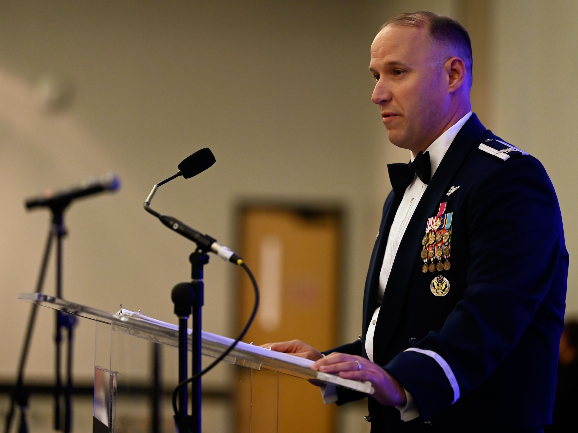 Col. Kenneth Voigt, 552nd Air Control Wing commander, delivers opening remarks at the 70th Anniversary Banquet. His message emphasized the enduring legacy and future of the wing.
(U.S. Air Force photo by Garrett N. Cole)
