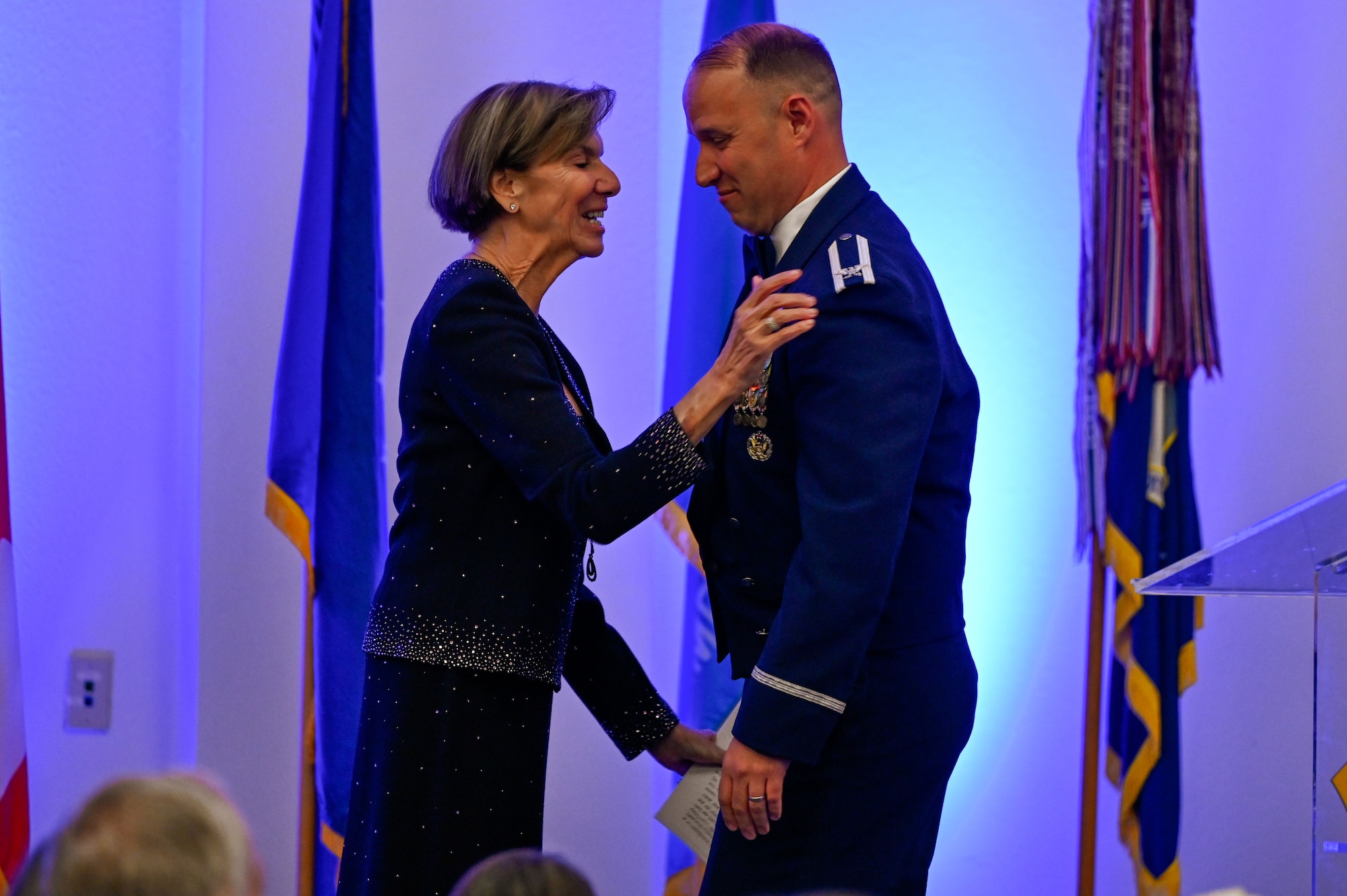 Col. Kenneth Voigt, 552nd Air Control Wing commander, embraces retired Gen. Lori J. Robinson during the 552nd Air Control Wing's 70th Anniversary Banquet. The evening highlighted mentorship, legacy and enduring partnerships.
(U.S. Air Force photo by Garrett N. Cole)
