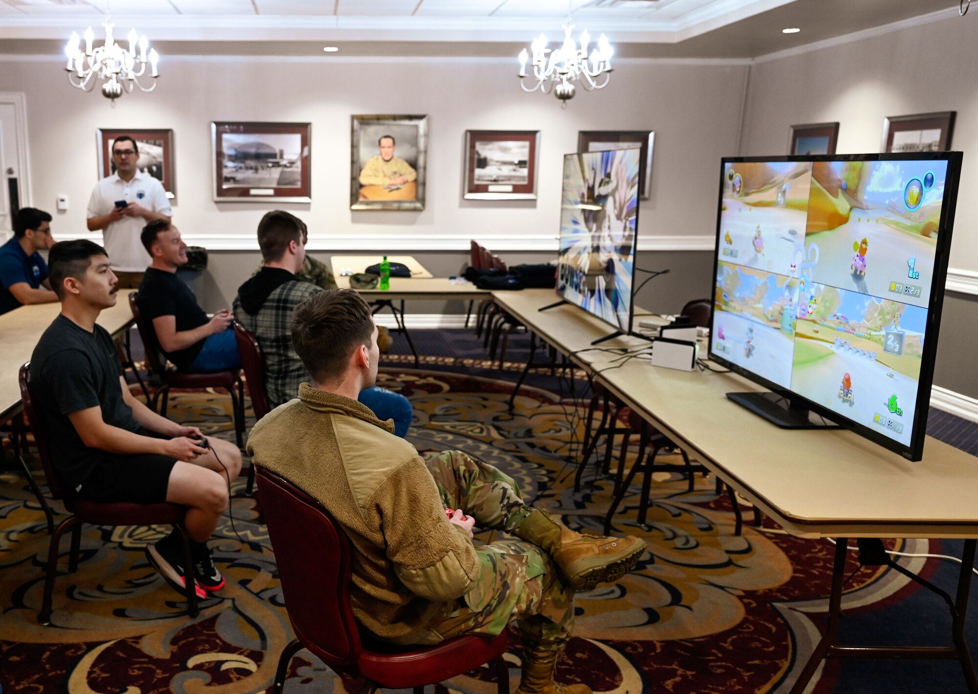 Airmen from the 552nd Air Control Wing gather for a gaming tournament during the Wing's 70th Anniversary celebration at the Tinker Event Center, March 28. The tournament offered a fun and competitive break from the routine.
(U.S. Air Force photo by Garrett N. Cole)