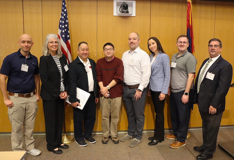 Leaders, organizers and presenters from the U.S. Army Corps of Engineers Los Angeles District team pose for photos before presentations begin at the Iron King Mine Project Industry Day Jan. 28 at Gateway Community College in Phoenix.  (Photo by Robert DeDeaux, USACE PAO)