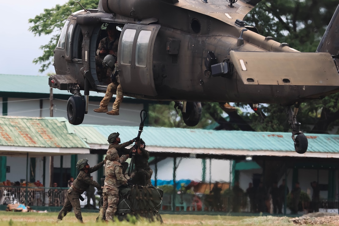 Soldiers with the Philippine Army 5th, 7th Infantry Division and U.S. Army with the Division Sustainment Brigade, 25th Infantry Division conducted combined Sling Load Tactical Operations training during Salaknib 2025 at Fort Magsaysay, Philippines, March 27, 2025.