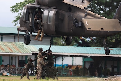 PHILIPPINES (March 27, 2025) — Soldiers with the Philippine Army 5th, 7th Infantry Division and U.S. Army with the Division Sustainment Brigade, 25th Infantry Division conducted combined Sling Load Tactical Operations training during Salaknib 2025 at Fort Magsaysay, Philippines, March 27, 2025. Salaknib is an annual bilateral exercise between the Armed Forces of the Philippines and the U.S. military, designed to improve interoperability, enhance capabilities, and strengthen the partnership built through decades of shared training and cooperation. (U.S. Army photo by Spc. Taylor Gray, U.S. Army Pacific Public Affairs)