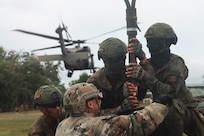Soldiers with the Philippine Army 5th, 7th Infantry Division and U.S. Army with the Division Sustainment Brigade, 25th Infantry Division conducted combined Sling Load Tactical Operations training during Salaknib 2025 at Fort Magsaysay, Philippines, March 27, 2025.