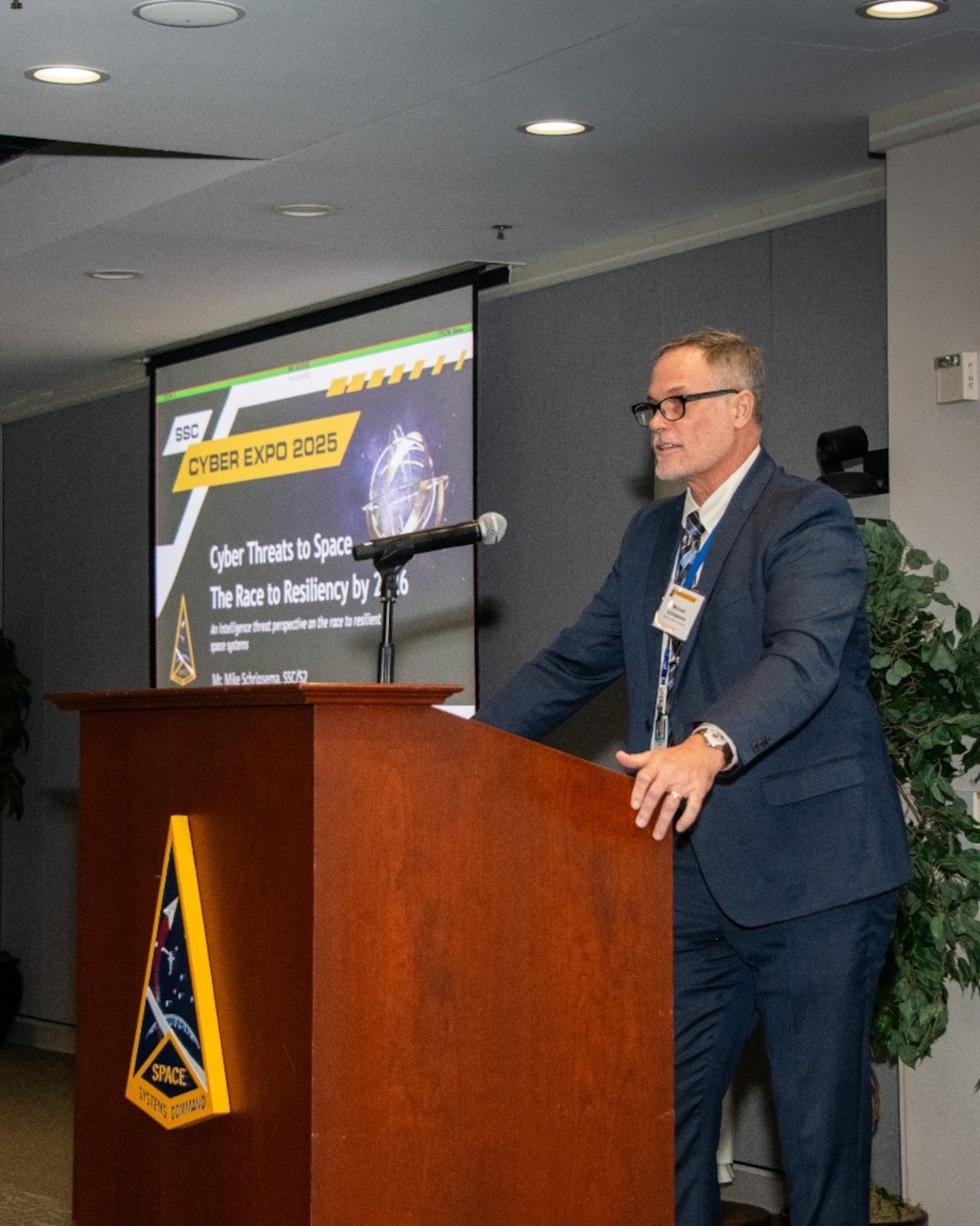 Mike Schripsema, an SSC cyber intelligence analyst, discusses specific cyber threats from China, Russia, North Korea and Iran at the 7th annual SSC Cyber Expo at SSC in El Segundo. 
In addition to various presentations over the two days of the Expo, April 22-23, 2025, visitors could also participate in a Capture-the-Flag event, visit vendor tables and a “cyber petting zoo.” Photo by Van Ha.