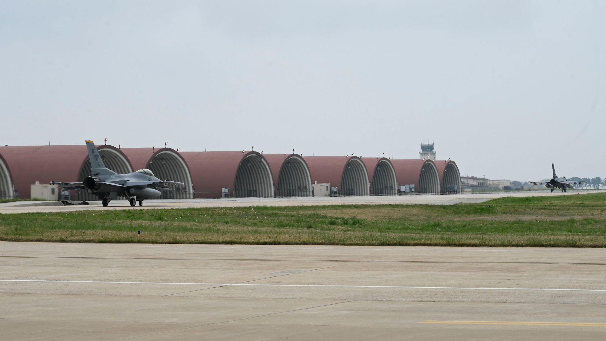 An F-16 Fighting Falcon aircraft, piloted by U.S. Air Force Col. Peter "Wolf" Kasarskis, 8th Fighter Wing commander, taxis before takeoff during exercise Freedom Flag 25-1 at Kunsan Air Base, Republic of Korea, April 23, 2025
