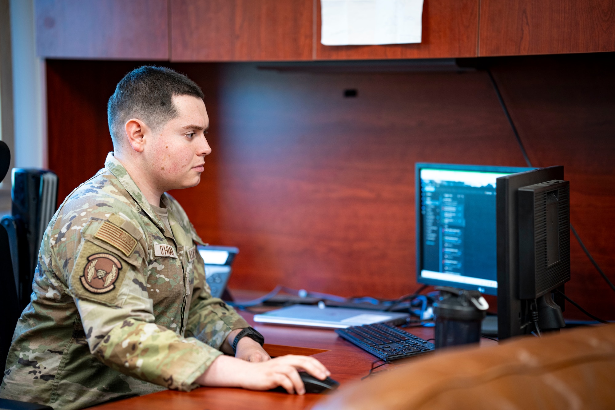 U.S. Air Force Senior Airman Michael O’Hagan, 51st Security Forces Squadron facility manager, updates work orders on his computer at Osan Air Base, Republic of Korea, April 30, 2025.