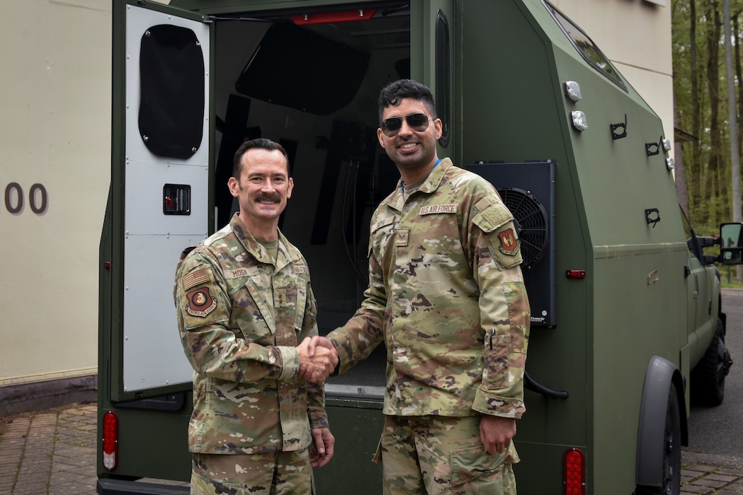 Maj. Gen. Paul Moga, Third Air Force commander, visited the 1st Air and Space Communications Operations Squadron to observe their critical mission firsthand.