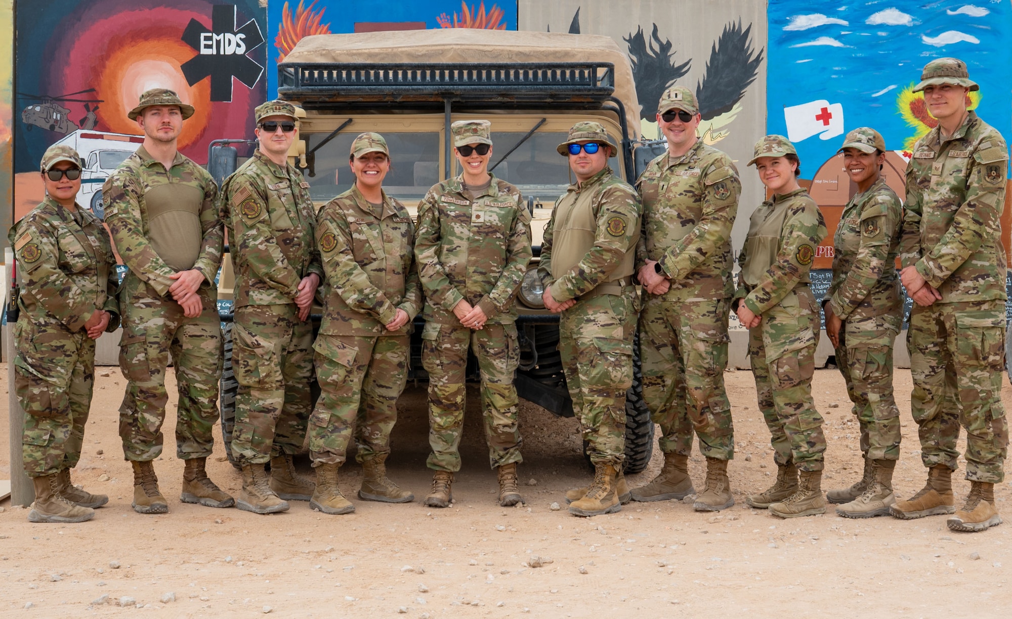 A group of Airmen pose for a photo.