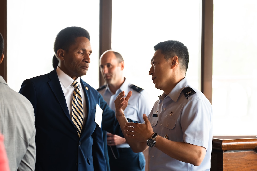 Col. Oh speaks with Maryland State Senator Arthur Ellis after the State of the Base address.
