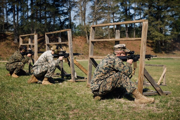 U.S. Marines with the Pacific region's shooting team engage targets as a part of the Infantry Team Trophy Match during the Marine Corps Championships hosted by Weapons Training Battalion at Marine Corps Base Quantico, Virginia, April 17, 2025. This competition brings together the top shooters from regional marksmanship events to test their precision rifle, action rifle, action pistol, and multi-gun action shooting skills. It continues the legacy of the Marine Corps Shooting Team, which has upheld marksmanship excellence since the early 1900s and reinforces the Corps’ commitment to marksmanship as a core warfighting skill. (U.S. Marine Corps photo by Cpl. Joshua Barker)