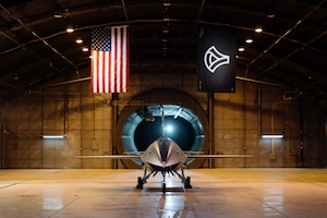 A YFQ-44A production representative test vehicle is staged in a testing chamber.