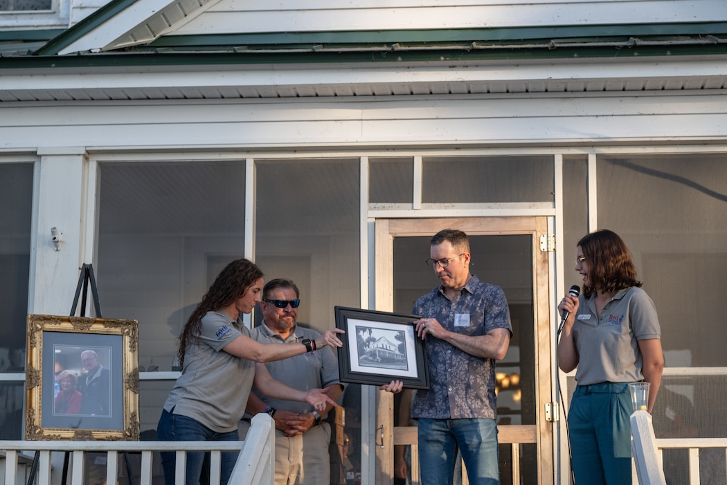 U.S. Air Force Maj. Gen. Sean Choquette, Department of the Air Force Chief of Safety, receives a gift.